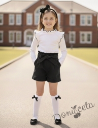 Комплект за момиче от къси панталони в черно и блуза в бяло с къдрици с черен кант