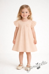 Детска ежедневна рокля с къс ръкав в прасковен цвят от памучен муселин
