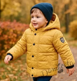 Детско зимно яке с качулка в горчица с качулка и джобове