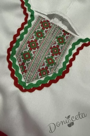 Дамска или детска народна носия- сукман в горната част в бяло а долна в зелено с престилка в червено с фолклорни/етно мотиви 