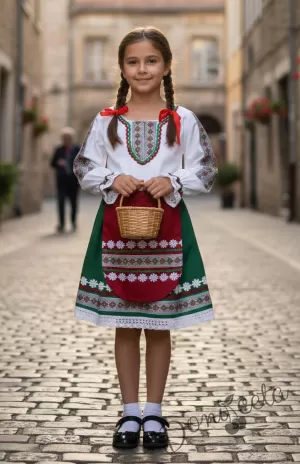 Дамска или детска народна носия- сукман в горната част в бяло а долна в зелено с престилка в червено с фолклорни/етно мотиви 