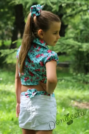 Детска ризка в тюркоазено синьо на цветя