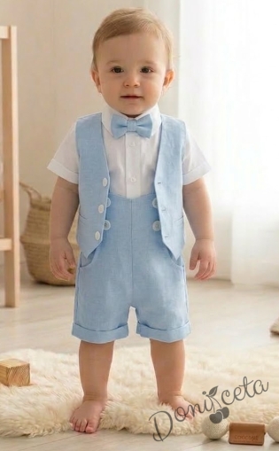 Летен комплект за момче в синьо от къси панталонки тип гащеризон, елек, папийонка и ризка в бяло с къс ръкав