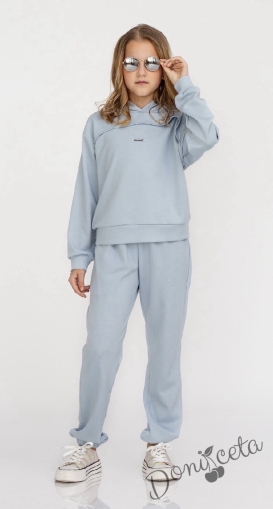 Спортен комплект за момиче от блузка с дълъг ръкав и долнище в светлосин цвят