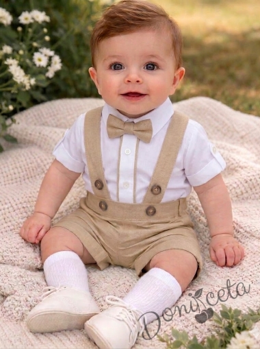Комплект за бебе момче от 3 части - боди риза в бяло с дълъг ръкав с възможност за навиване ,къси панталони тип гащеризон и папийонка в  бежов цвят