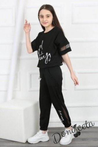 Комплект за момиче от блуза и панталон в черно с надпис