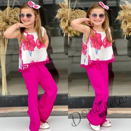Детски комплект за момиче с дълъг панталон тип чарлстон в циклама и блуза без ръкав в бяло с ресни и цветя в циклама 1