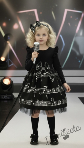 Детска рокля с дълъг ръкав в черно с къдрички на ръкавите и ноти и тюл в долната част