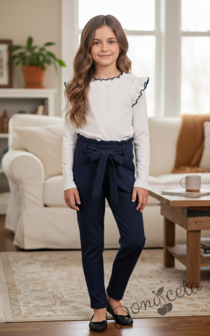 Комплект от 2 части- панталон в тъмносиньо с ластик и колан, блуза с дълъг ръкав в бяло с къдрички и кант в тъмносиньо