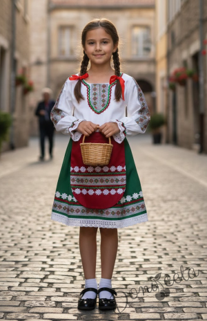 Дамска или детска народна носия- сукман в горната част в бяло а долна в зелено с престилка в червено с фолклорни/етно мотиви 