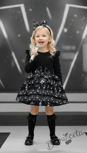 Детска рокля с дълъг ръкав в черно с къдрички на ръкавите и ноти в долната част