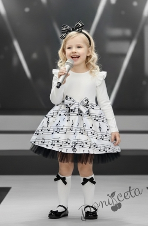 Детска рокля с дълъг ръкав в бяло с ноти и тюл в долната част