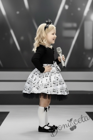 Детска рокля с дълъг ръкав в черно и бяло с ноти и тюл в черно в долната част