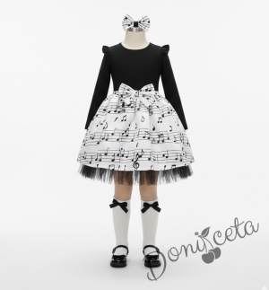 Детска рокля с дълъг ръкав в черно и бяло с ноти и тюл в черно в долната част