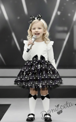 Детска рокля с дълъг ръкав с горна част в бяло и с черна долна част с ноти и тюл в черно в долната част