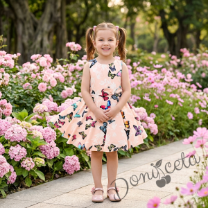 Детска рокля клош в прасковено с пеперуди 