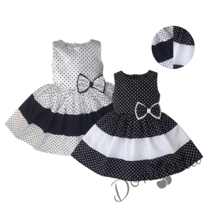 Детска рокля без ръкав в бяло на черни точки с лента в бяло Далента