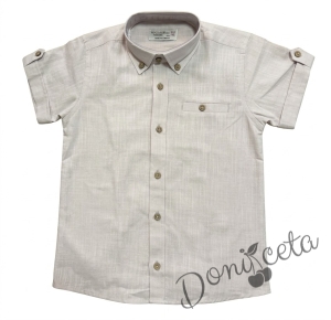 Комплект за момче състоящ се от бял панталон с колан  и риза в бежов цвят 