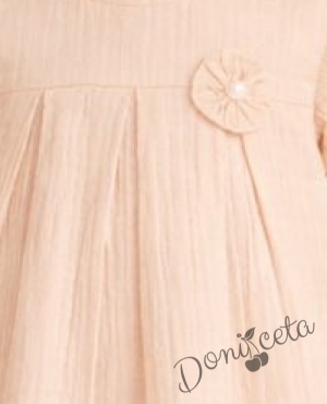Детска ежедневна рокля с къс ръкав в прасковен цвят от памучен муселин