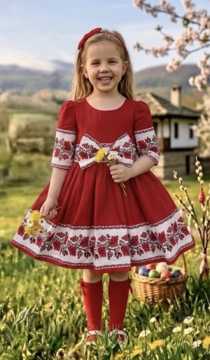 Детска етно рокля Боряна в червено тип носия с ръкав до лакътя с коланче с панделка в бяло с шевица и фолклорни мотиви 