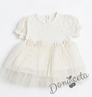 Бебешка рокля в екрю с нежна бродерия и панделки