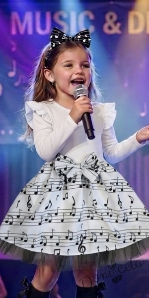 Детска рокля с дълъг ръкав в бяло с черни ноти в горната част и тюл в долната част