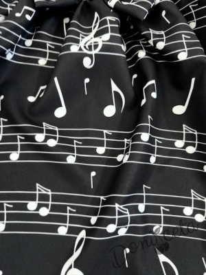 Детска официална рокля с дълъг ръкав в черно с къдрички на ръкавите и ноти и тюл в долната част