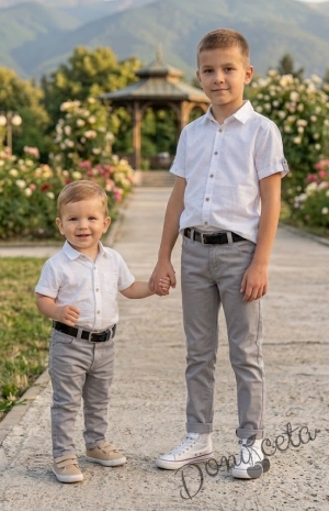 Спортно-елегантен панталон за момче със скрит джоб в сиво