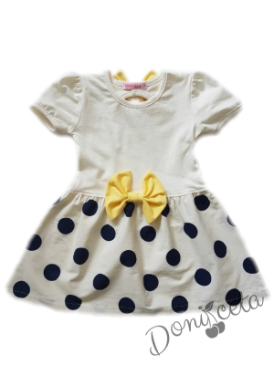 Лятна детска рокля на точки и панделки в жълто