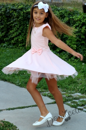 Girls dress in pink with butterflies