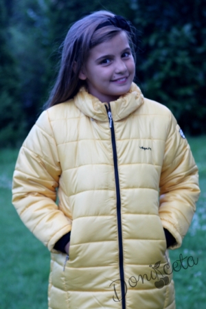 Winter  jacket in mustard colour with a hood 