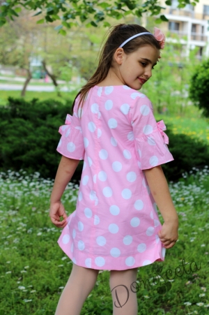 Лятна детска рокля на точки в розово с ръкави с панделки