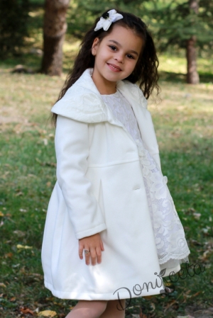 Children's coat for a girl in champagne colour with lace and ribbons