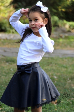 Детска кожена пола  в тъмносиньо за момиче с панделка отпред