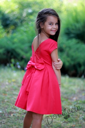 Детска рокля в цвят малина с къс ръкав и голяма панделка отзад