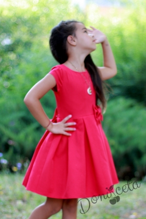Детска рокля в цвят малина с къс ръкав и голяма панделка отзад