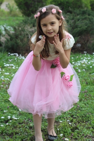 Official children"s dress with roses