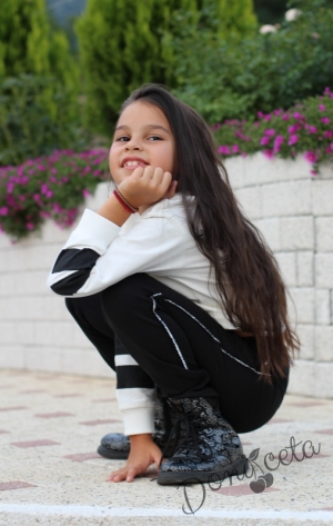Елегантен детски панталон за момиче в черен цвят с джобове