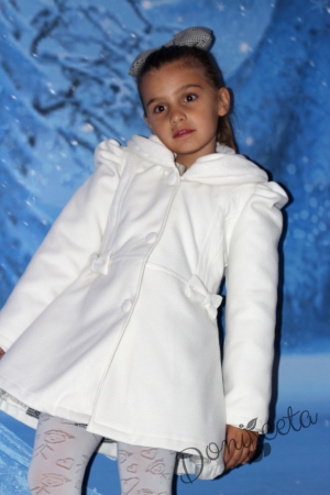 Children's winter coat for a girl in white with lace and ribbons