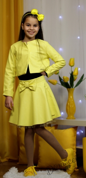 комплект в жълто от пола и късо сако от кожа