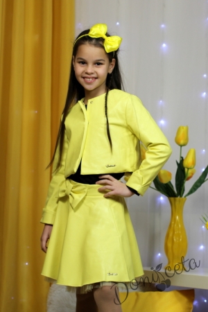 Детска кожена пола  в жълто за момиче с панделка отпред
