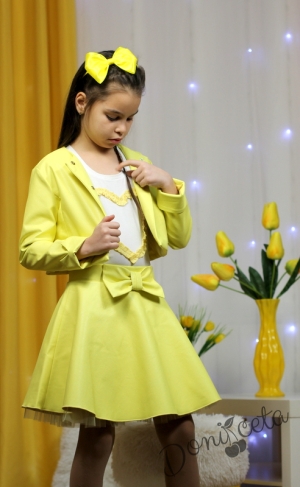 Детска кожена пола  в жълто за момиче с панделка отпред