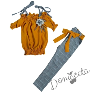 Детски комплект от блузка с къс ръкав в цвят горчица и кариран панталон