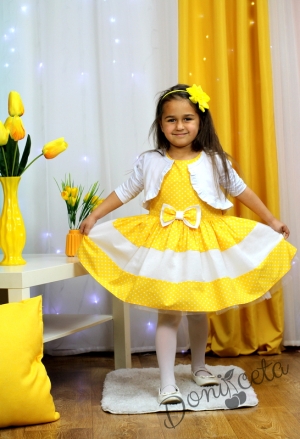 Комплект от детска рокля в жълто на бели точки с болеро 