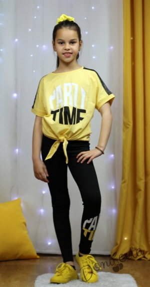 Летен детски комплект от къса тениска в жълто и клин в черно 8224388