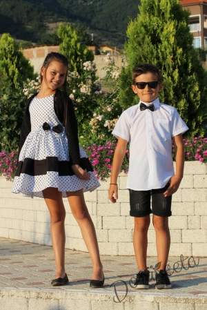 Детска официална рокля в бяло на черни точки с болеро в черно 