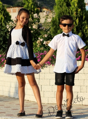 Детска официална рокля в бяло на черни точки с болеро в черно 