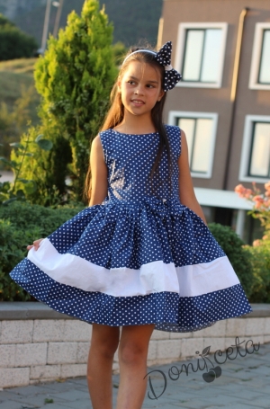 Официална детска рокля в тъмносиньо на точки в бяло 