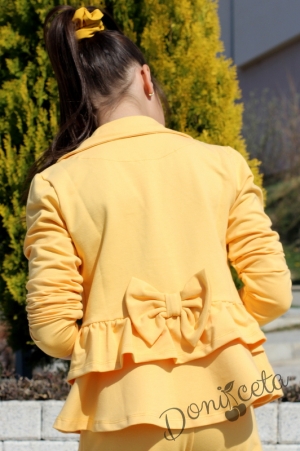 Детско сако за момиче в жълто с къдрички и панделка отзад