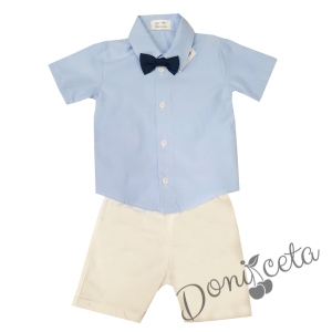 Комплект за бебе момче от риза в светлосиньо и къси панталонки в бялоКомплект за бебе момче от риза в светлосиньо и къси панталонки в бяло 1